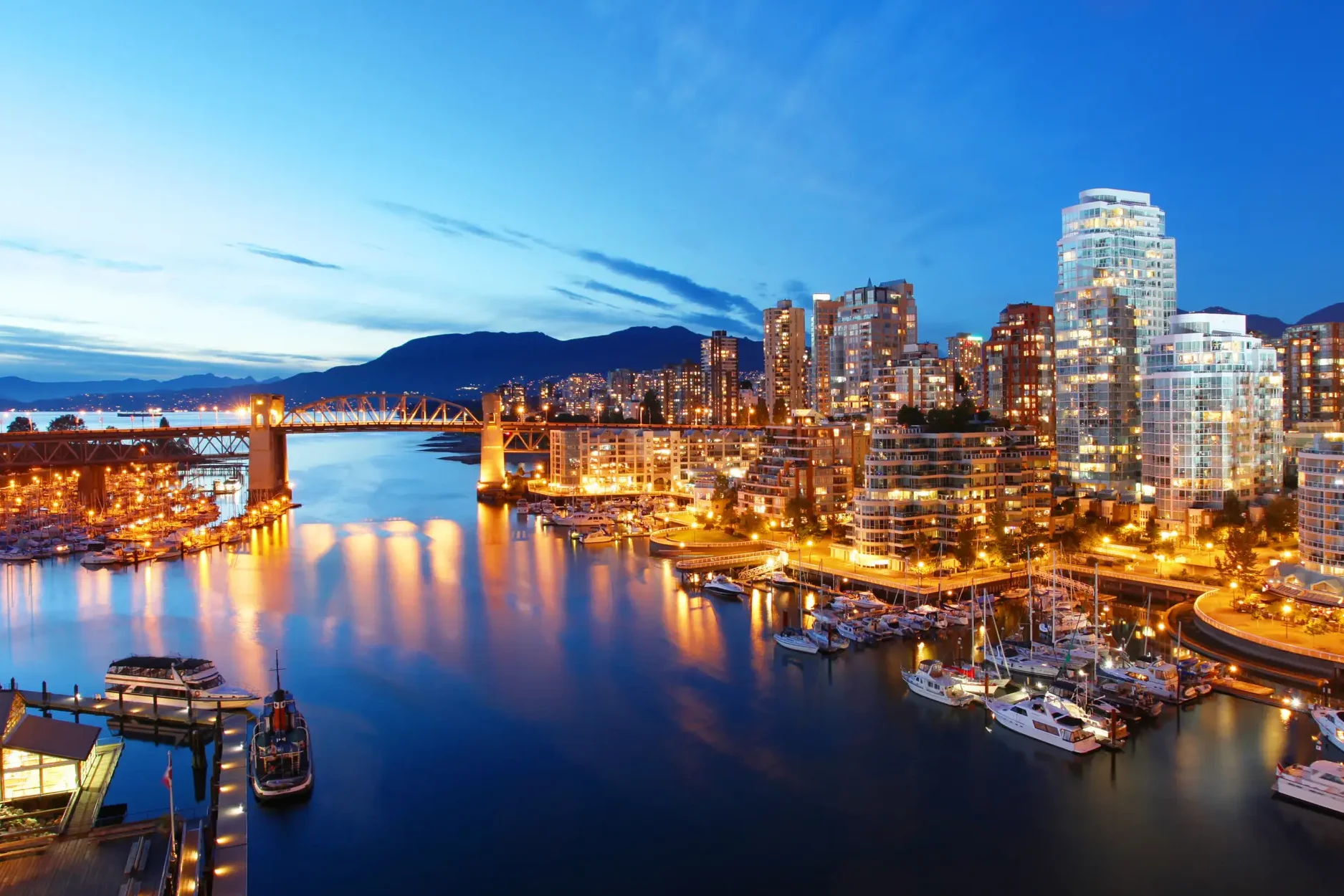 Modern condo building in Vancouver's False Creek area - Mortgage financing by HomeHappy